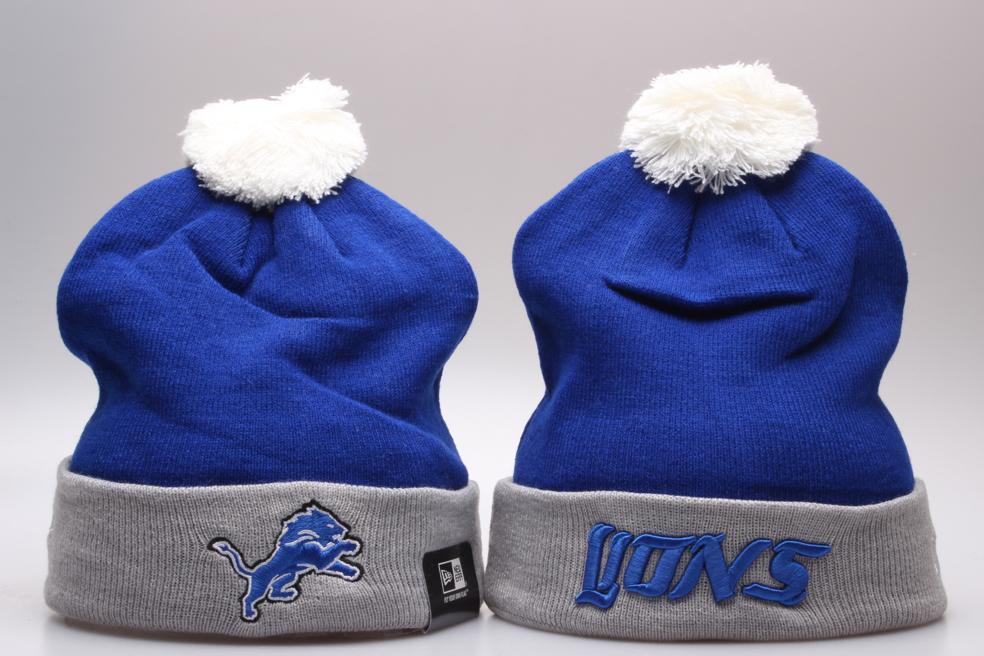 Lions Team Logo Blue Gray Pom Knit Hat YP